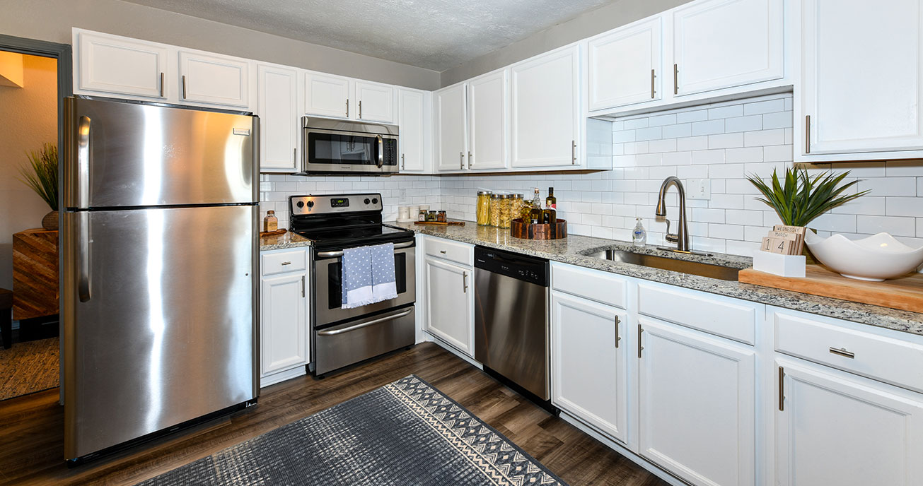 living room with furniture and bar, 550 Abernathy, atlanta ga